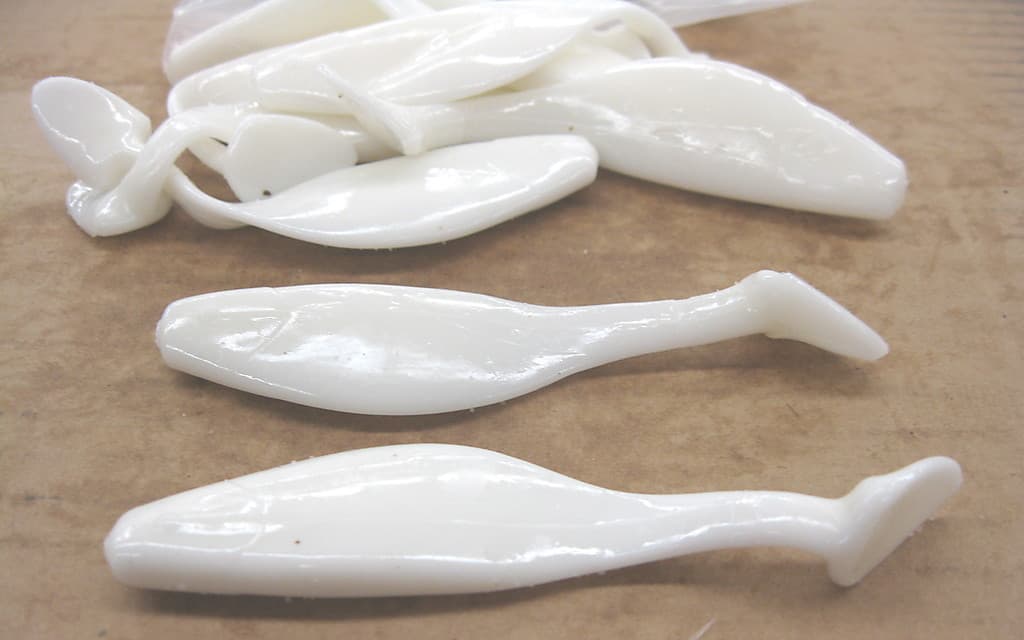 4" Shad Paddle Tail Swimbait great for Umbrella Rig 40 count bag Sassy White - Image 1