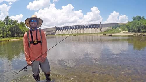 Fishing Under Lake Dam Before the Water Comes