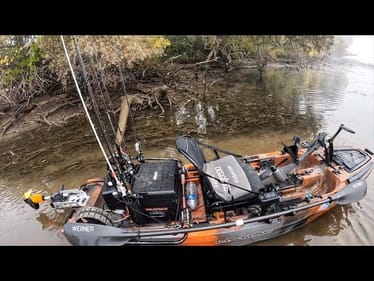 Shallow river fishing in Small kayak