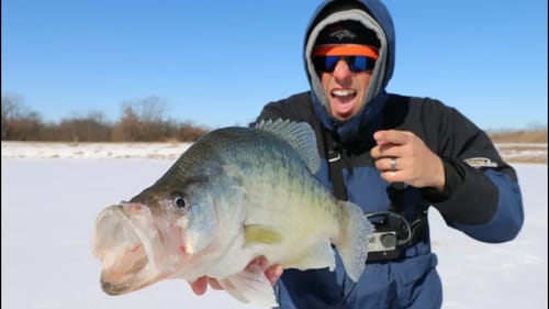 BIGGEST CRAPPIE EVER! ICE Fishing A HIDDEN Pond!
