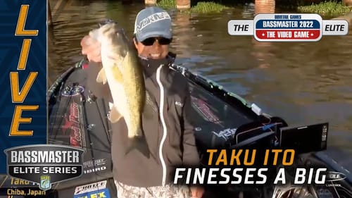 Taku Ito finesses a big bass on the Sabine River