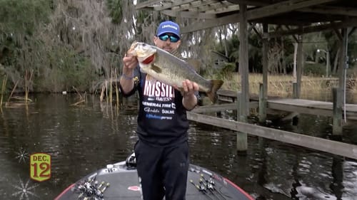 John Crews tangles with a St. Johns Giant