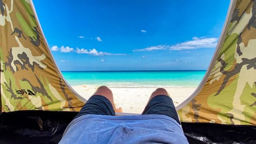 Sleeping On A Tropical Island Beach