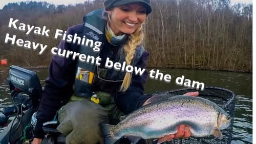 KAYAK fishing below the dam