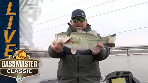 John Cox catches a tattooed largemouth on Grand Lake