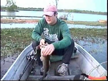 Largemouth bass fishing in weeds