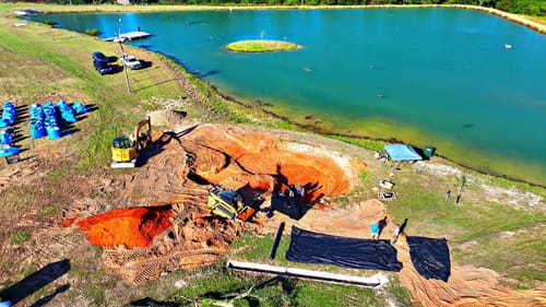 Building a Giant Waterfall and 30,000 Gallon Aquascape Pond!