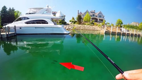 Catching BIG bass off MILLION dollar YACHTS in Crystal Clear Water