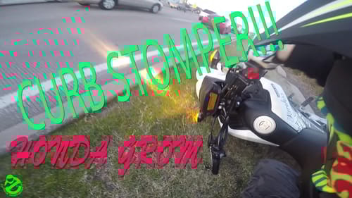HONDA GROM JUMPS CURB AND WRECKS