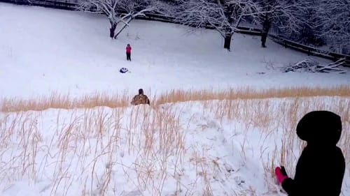Abbie and Ott sledding