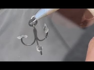 What Fish Scales On Your Hook Points Tell You About Bass Behavior