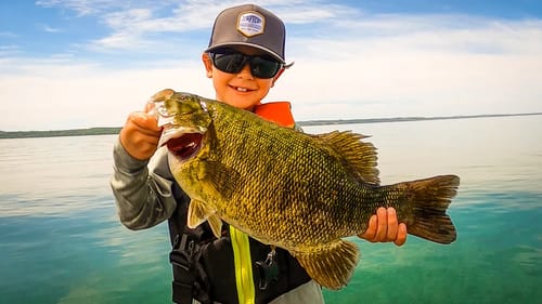 8 Year Old Catches GIANT Smallmouth In Crystal CLEAR Water!